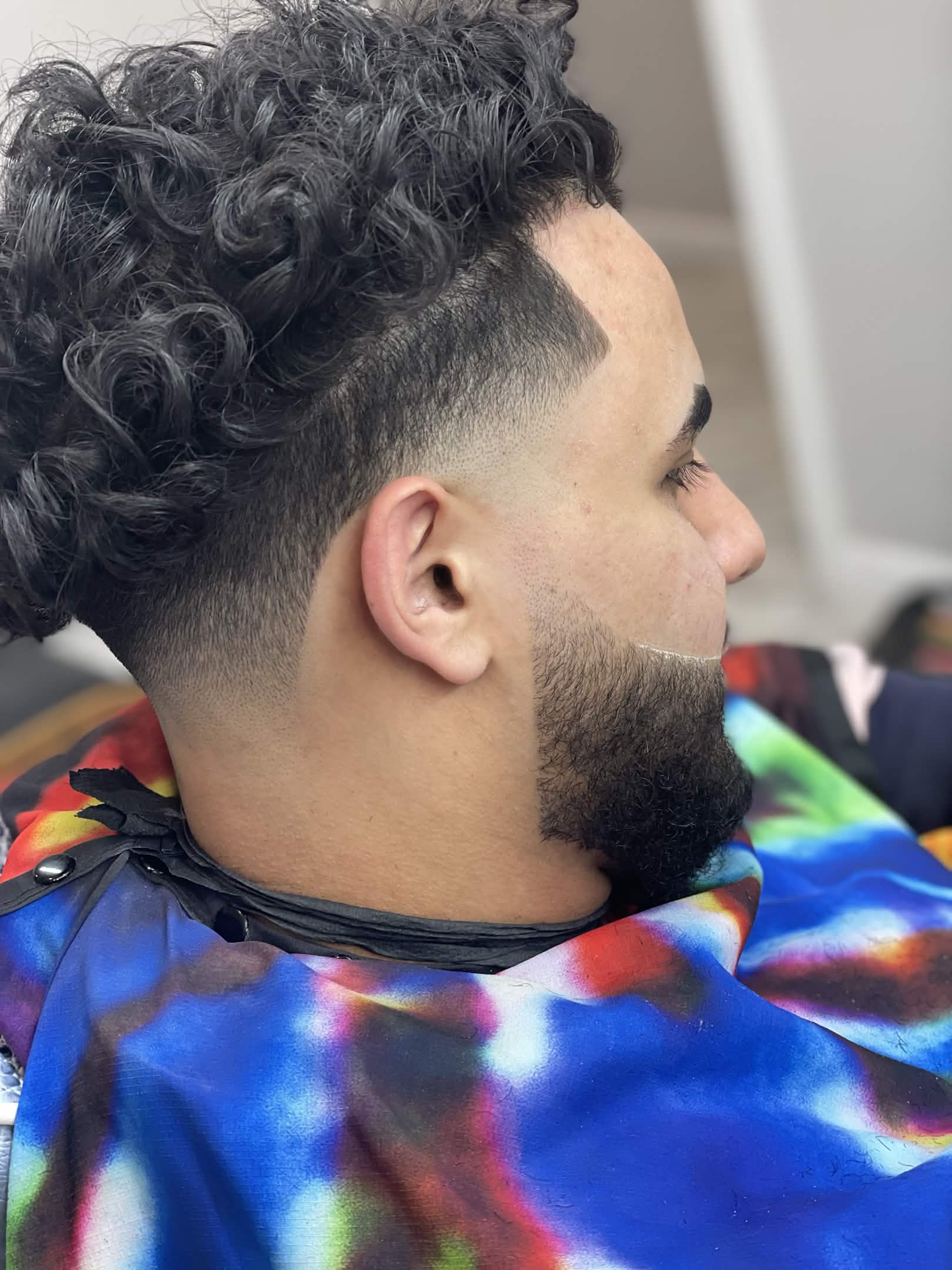 Waves and taper fade with beard trim by Kevin